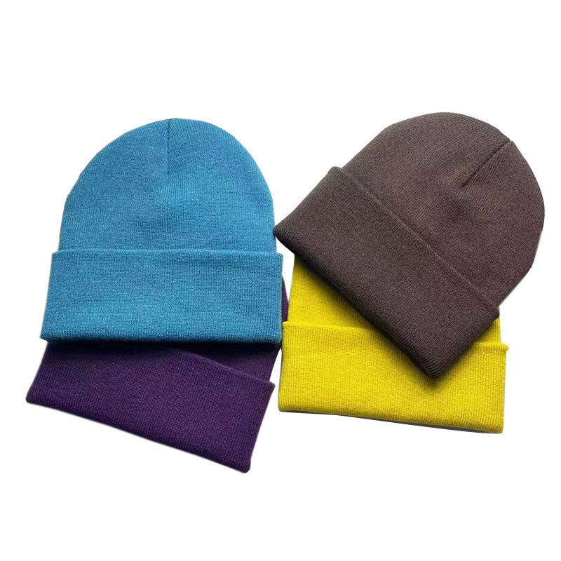 Wholesale Solid color knitted hat,  smooth plate cold hat curled brim Hat