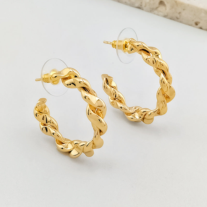 Wholesale twist earrings plain ring light luxury copper plated gold earrings