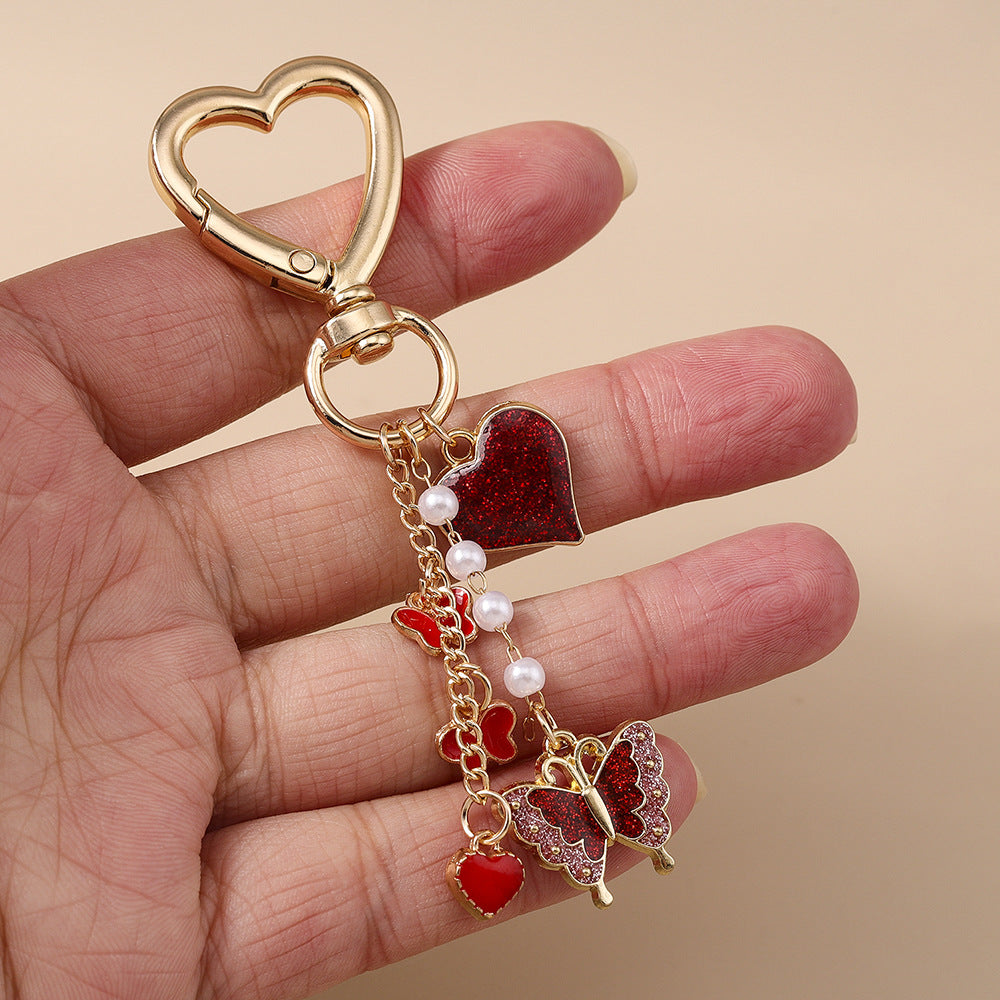 Wholesale Alloy pearl butterfly keychain heart and flower keychain