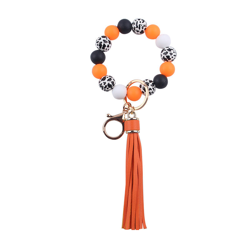 Wholesale leather PU tassel silicone beads wooden beads DIY  bracelet keychain