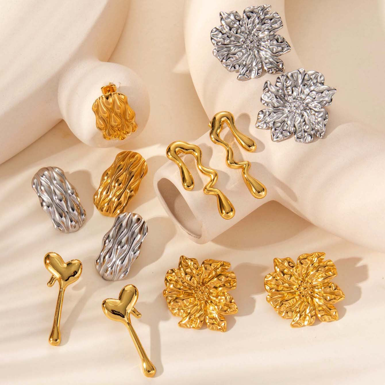 Wholesale  irregular drop-shaped love titanium steel liquid high-grade temperament  light luxury earrings