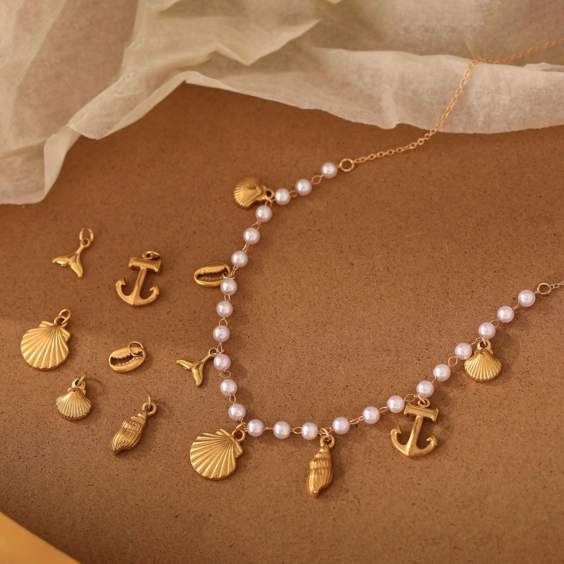 Wholesale Stainless steel fish tail,  seashell,  conch,  and anchor pendant necklace