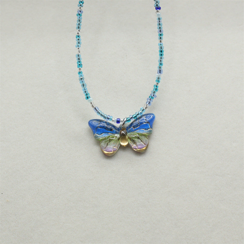 Wholesale gradient color bronzing butterfly sweet pendant rice beads beaded necklace