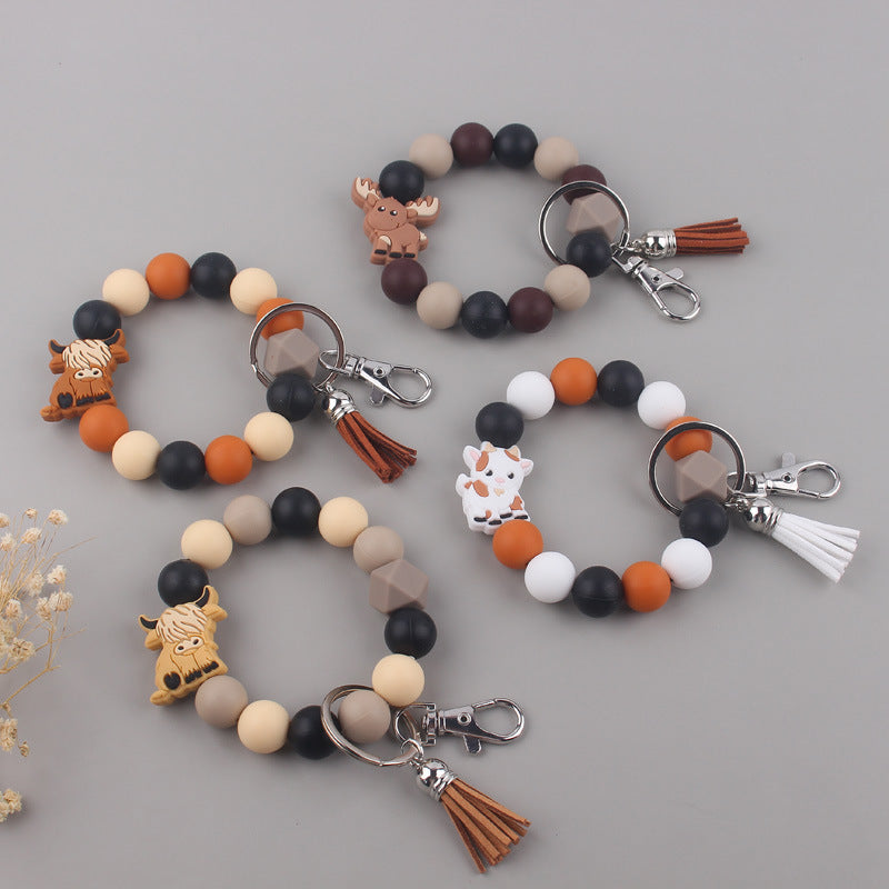 Wholesale Cartoon silicone cow keychain accessories creative handmade wristlet keychain