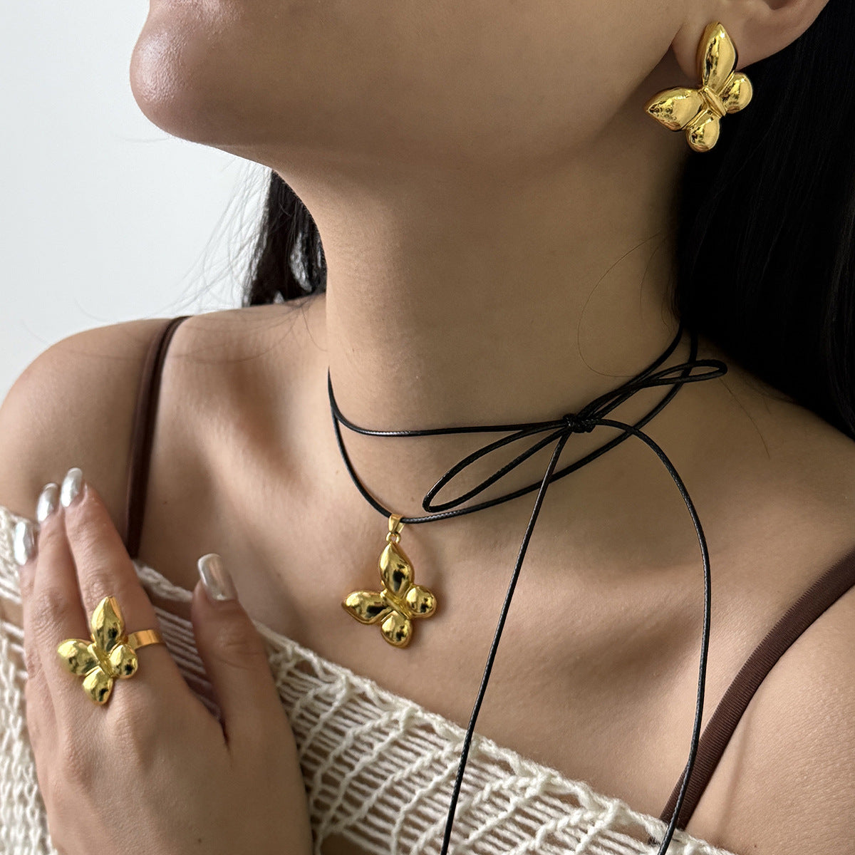 Orecchini a farfalla all'ingrosso Stessa collana di cera Anello in lega tutto-fiammifero