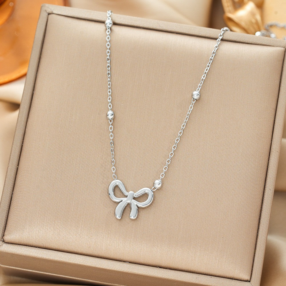 Wholesale Titanium Steel Gold Bow Pendant Necklace - Fashion Accessory for Boutique Resale