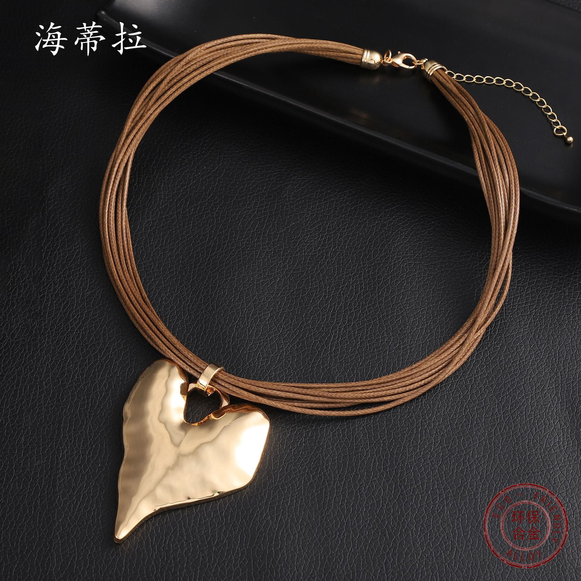 Wholesale golden three-dimensional heart-shaped leather rope pendant irregular heart-shaped necklace