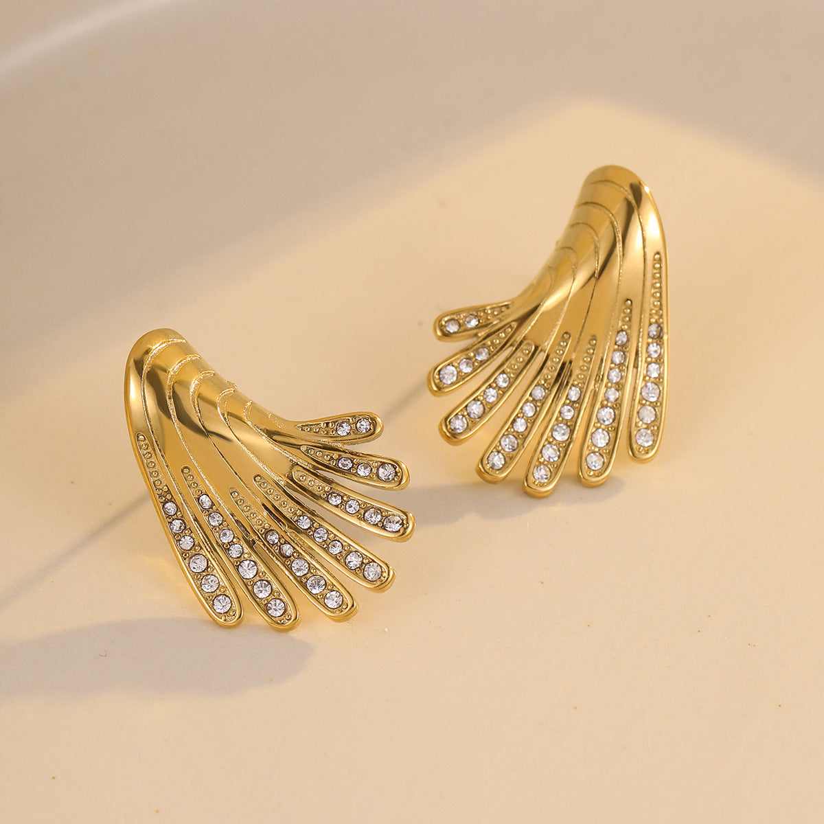 Wholesale exaggerated stainless steel irregular wings micro-inlaid zircon earrings