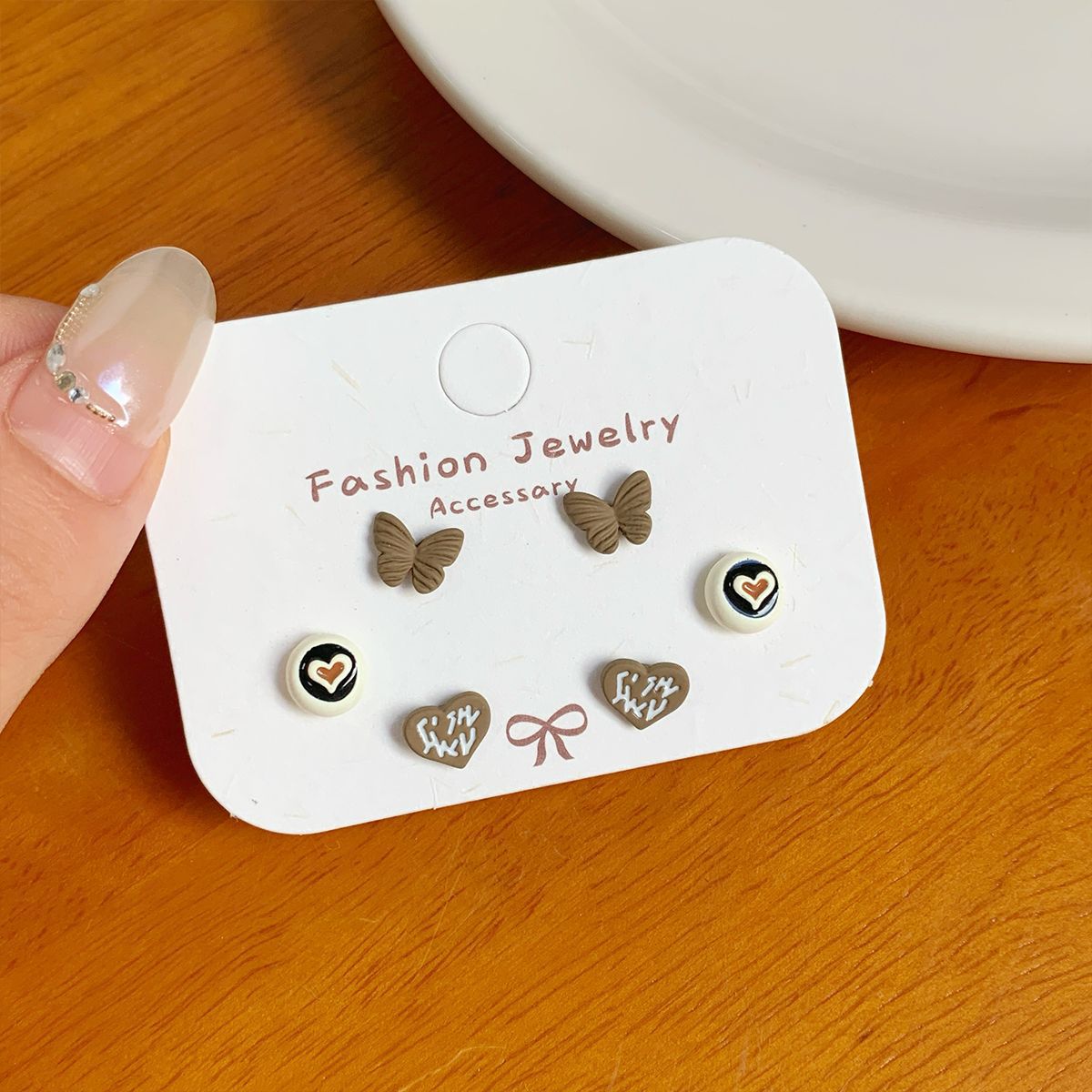 Wholesale Autumn cat geometric bean earrings set silver needle simple small flower bow earrings