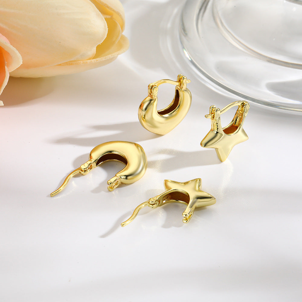 Wholesale glossy hollow star earrings