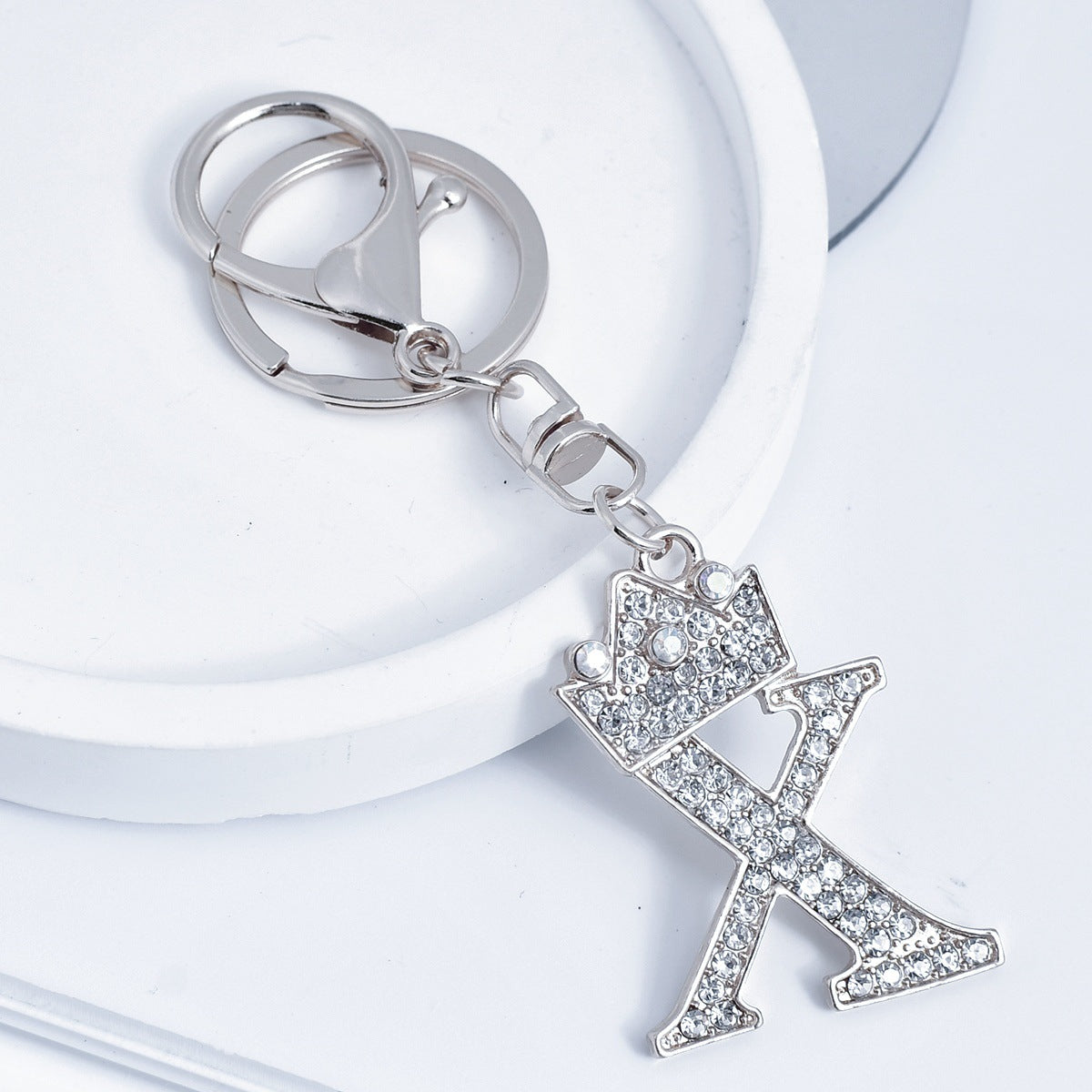 Wholesale Stylish Rhinestone 26 Letter Keychain Zinc Alloy Silver Metal Pendant Car Backpack Accessory Fashion Jewelry Gift For Resale