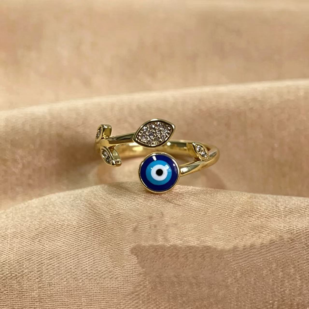 Wholesale 18K Gold Plated Brass Devil' s Eye Open Ring with Blue Zircon Jewelry Accessory