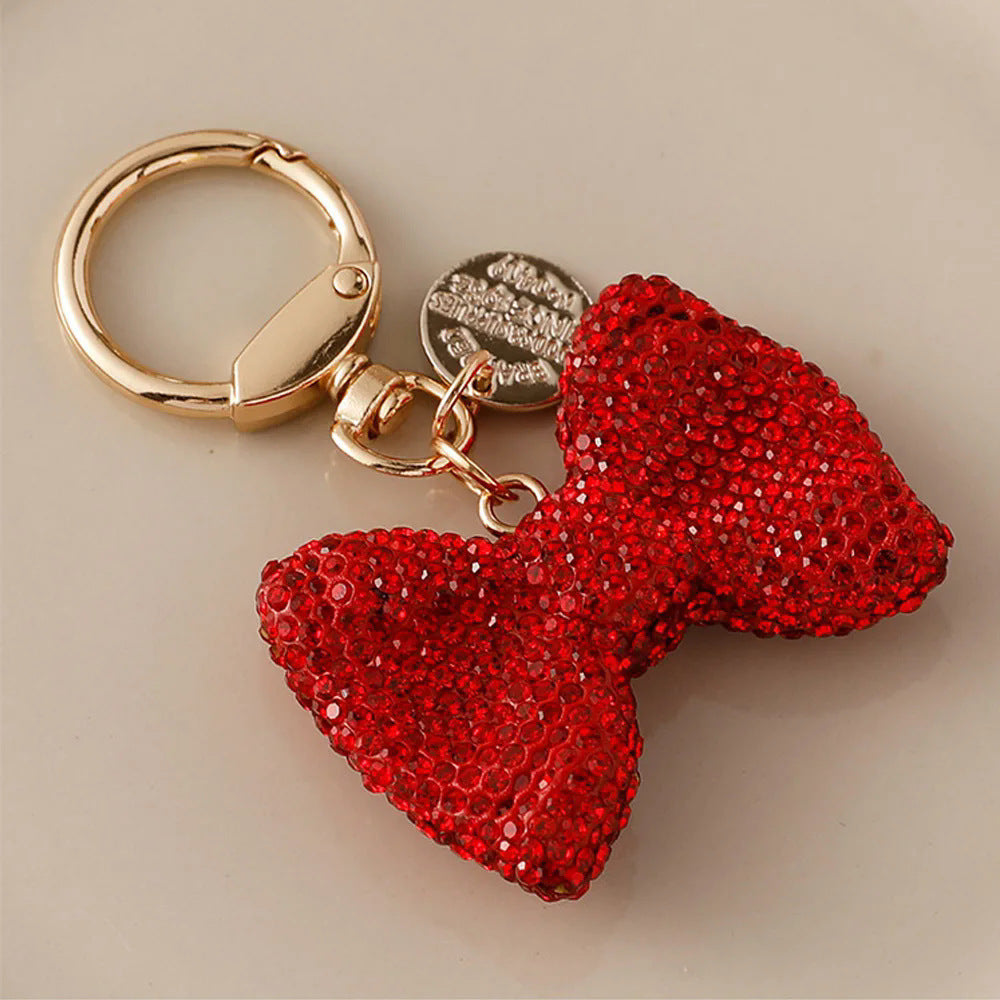 Wholesale Metal keychain with full rhinestone butterfly and bowknot pendant