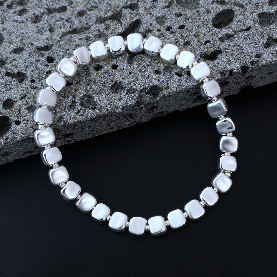 Wholesale small square grain three-color stitching alloy bracelet