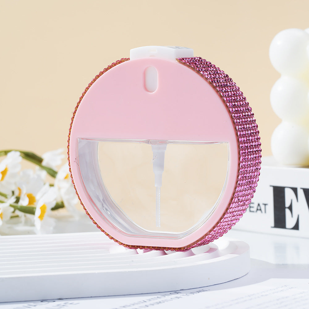 Wholesale 35ml round alcohol spray bottle keychain