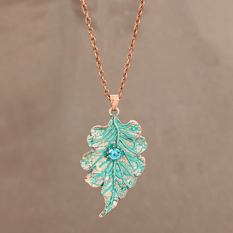 Wholesale Vintage-Style Distressed Leaf Vein Pendant Necklace — Antique Bronze &  Lake Green Enamel Leaf with Blue Crystal Accent — Forest-Themed Alloy Jewelry