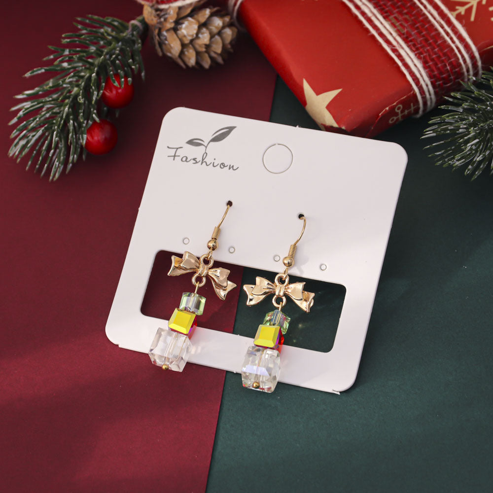 Orecchini in cristallo con stella e fiocco all'ingrosso