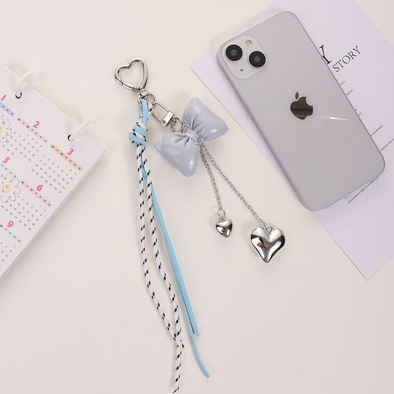 Wholesale Leather cord bow tassel keychain