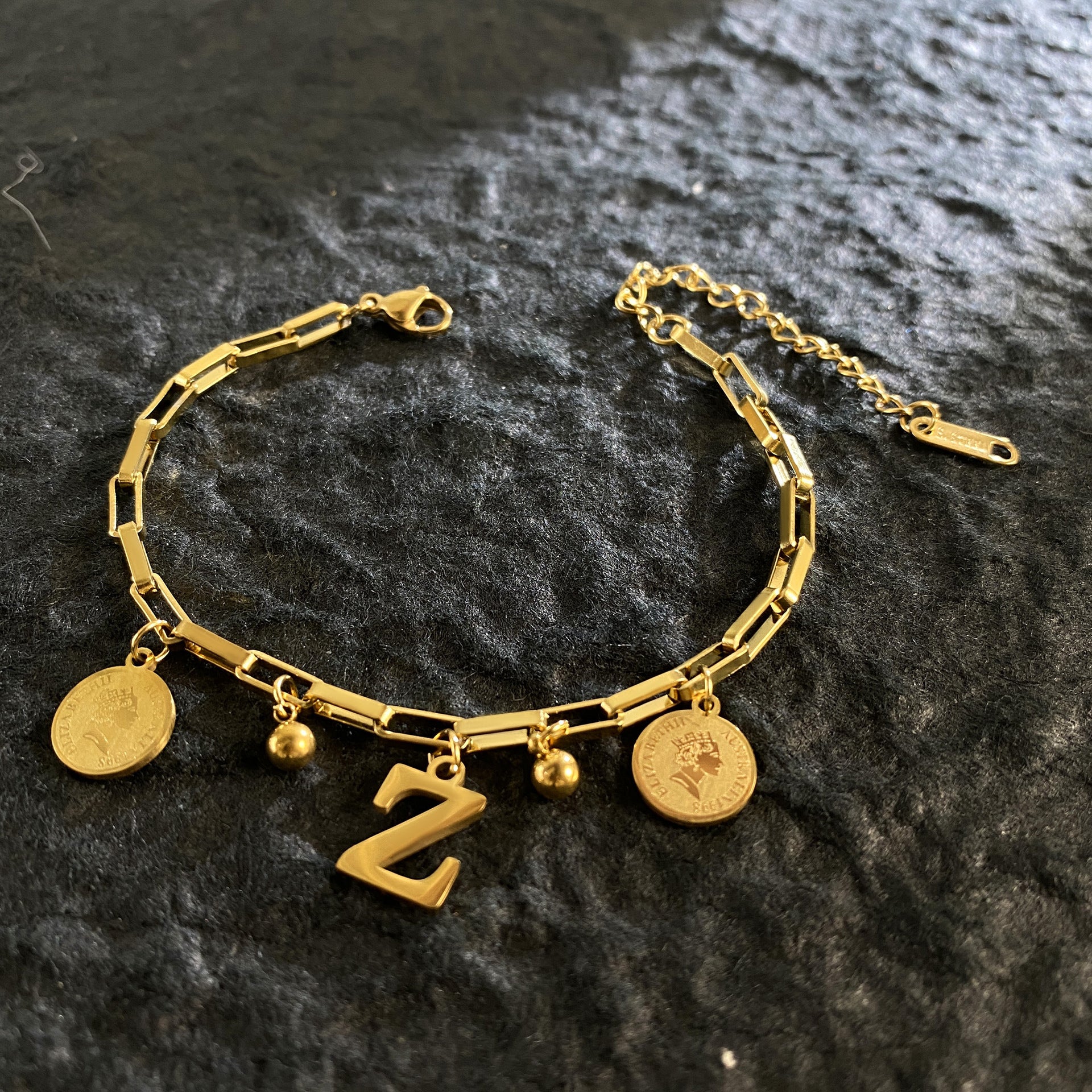 Wholesale Titanium Steel 18K Gold Plated Queen's Head Letter Bracelet ACC-BT-YuXun007