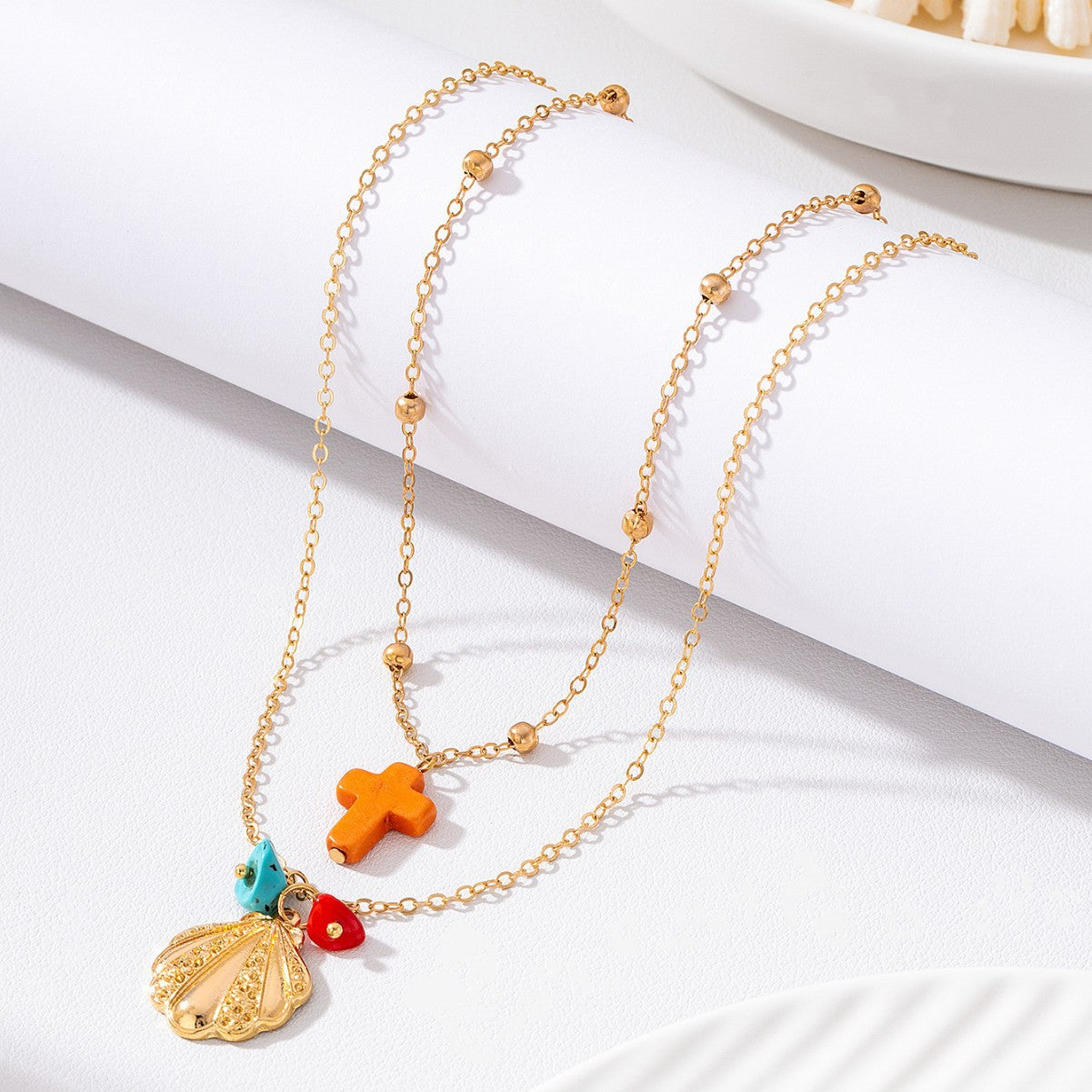 Wholesale Stylish Gold Double Layer Bead Chain Necklace With Colorful Cross Shell Pendant Casual Beach Layering Jewelry For Resale