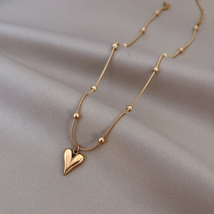 Wholesale snake bone chain heart necklace