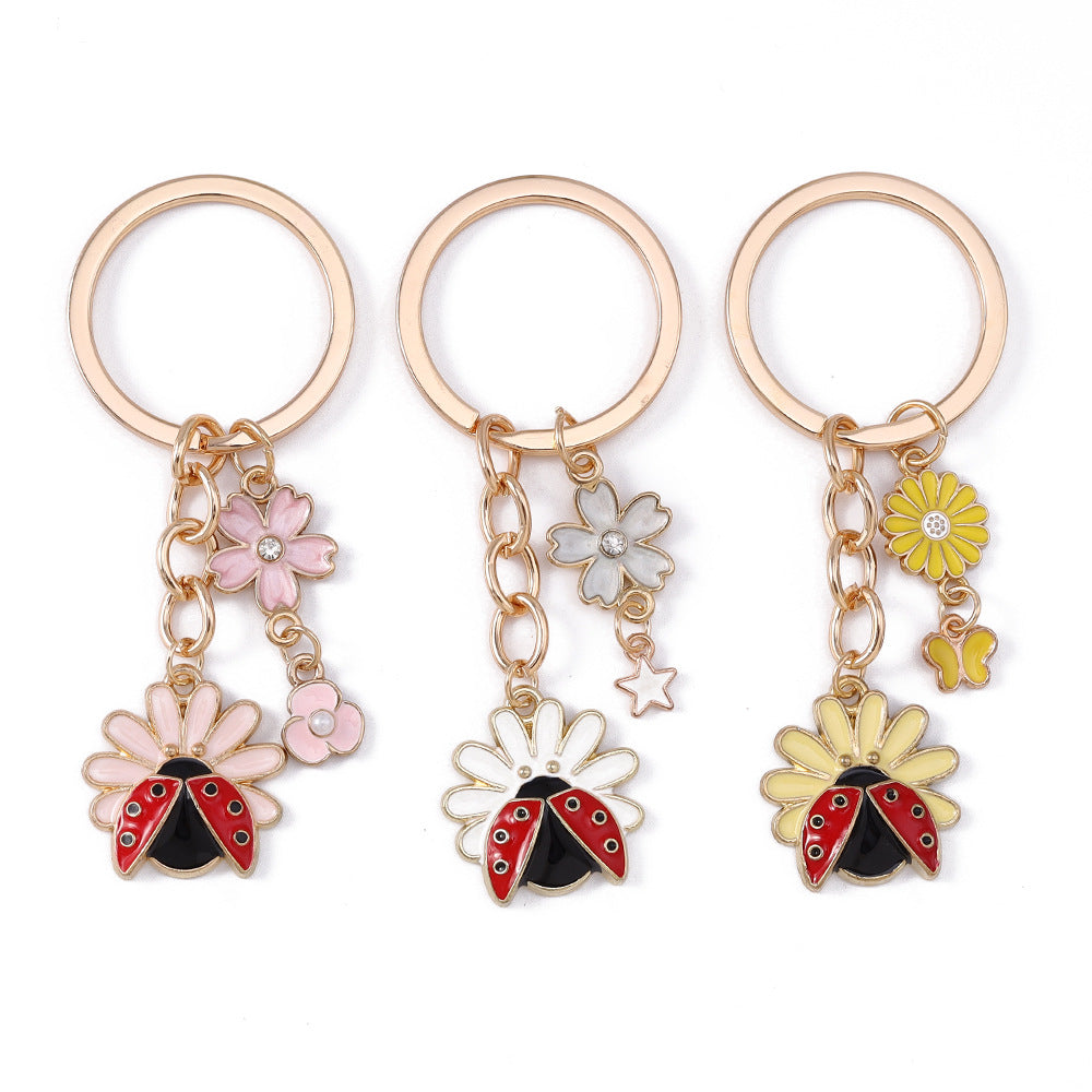 Wholesale Alloy animal and flower keychain