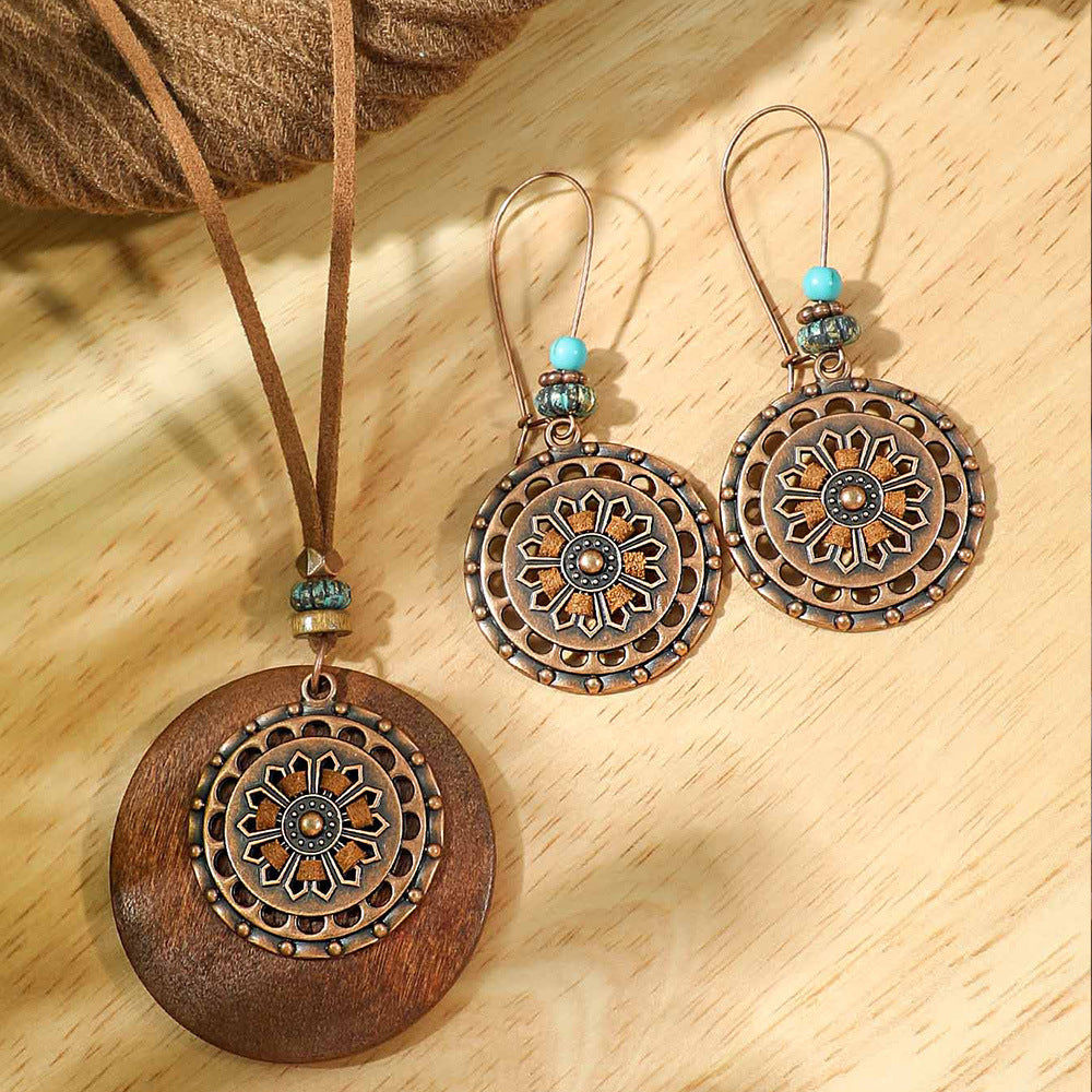 Wholesale Retro Bohemian Alloy Electroplated Jewelry Set Round Hollow Earrings Long Necklace Party Wear