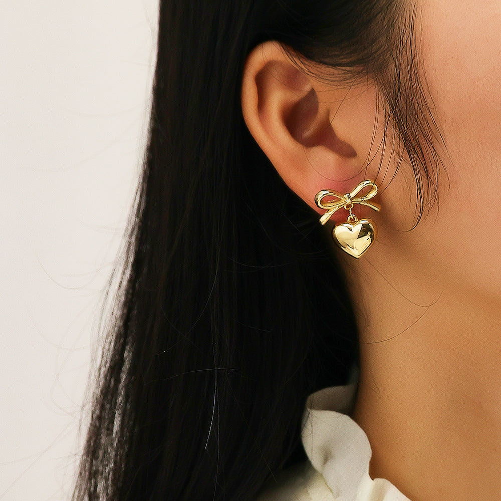 Wholesale Jewelry Love Bow Pearl Titanium Steel Earrings ACCVIP-ES-DaLang002