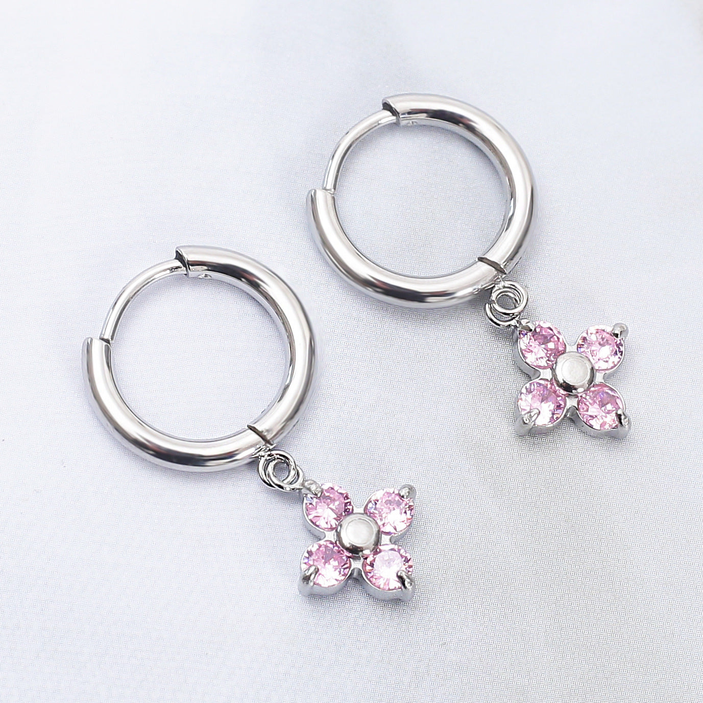Wholesale Stainless steel flower earrings with zircon inlay