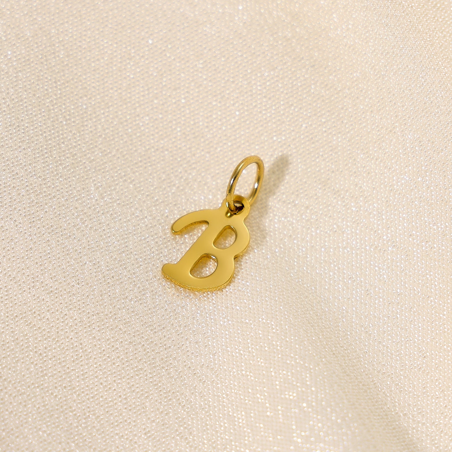 Wholesale 26 English letters stainless steel letter pendant