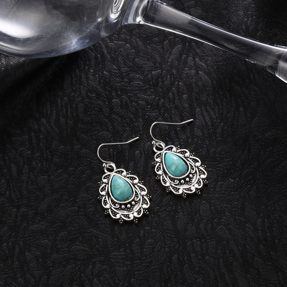 Wholesale Bohemian turquoise teardrop shaped carved earrings