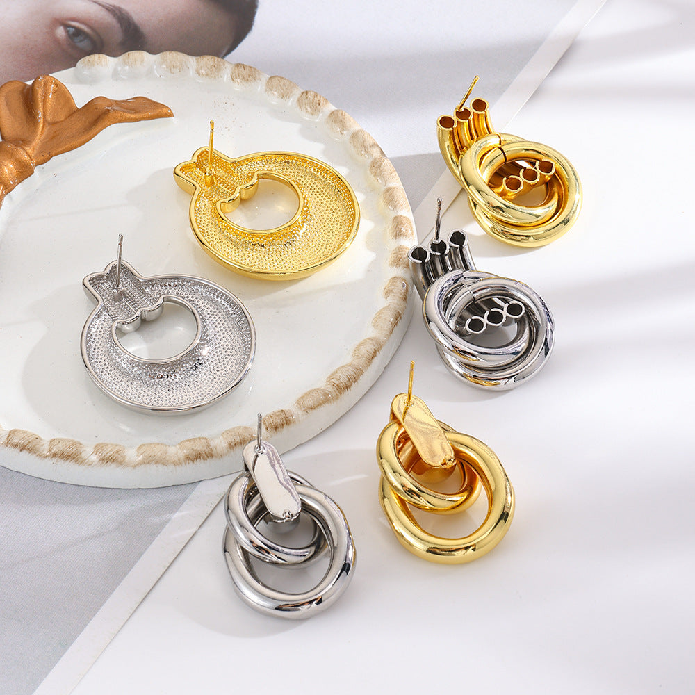 Wholesale geometric exaggerated smooth hollow tube winding earrings