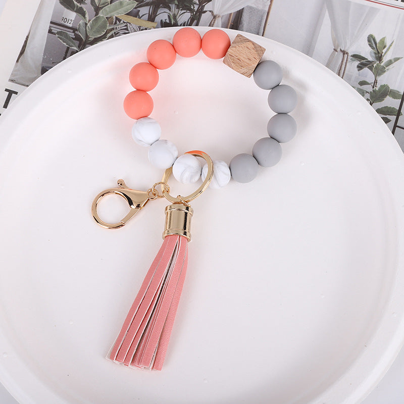 Wholesale Trendy Silicone Bead Bracelet With Tassel Wooden Bead Keychain Natural Geometry Style Chic Jewelry Accessory Gift