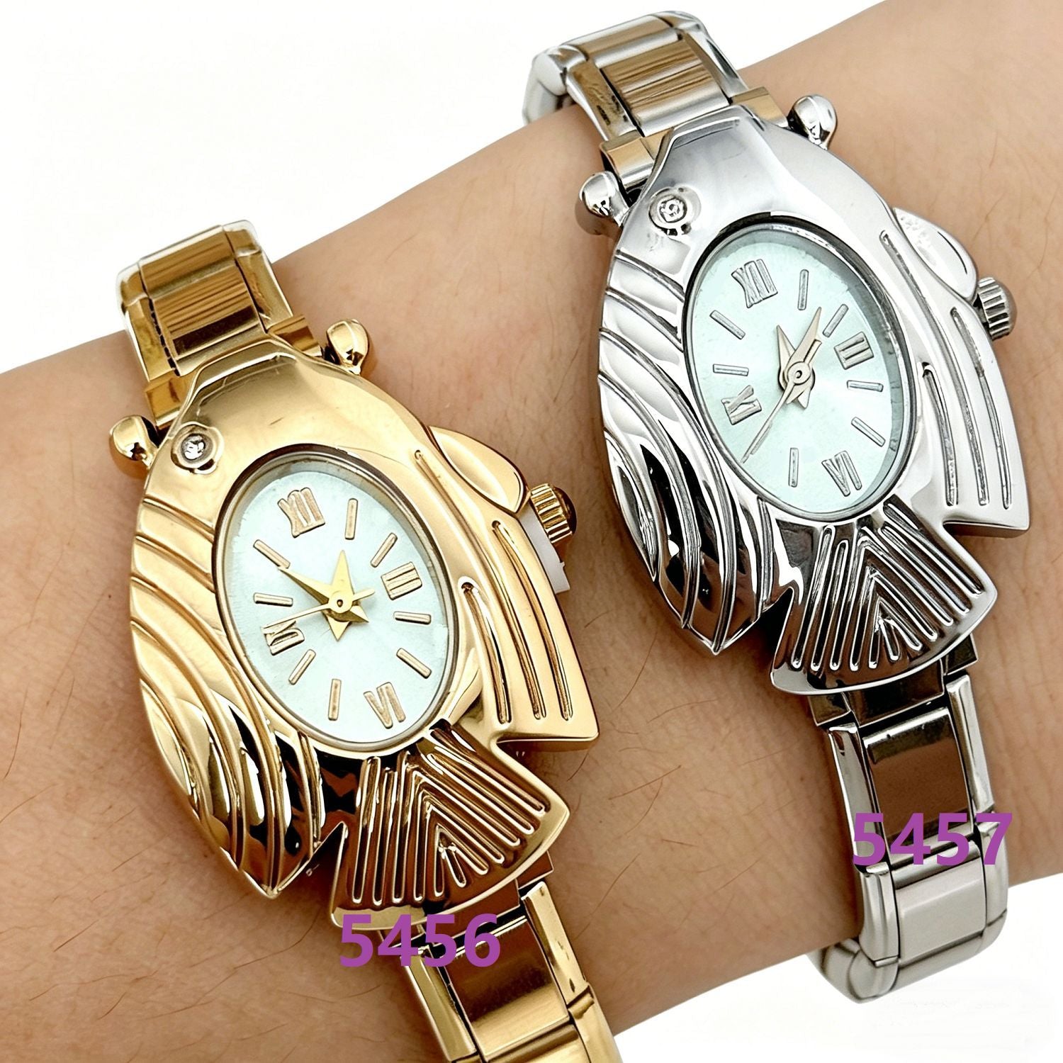Wholesale Flying Fish Auspicious Simple Oval Quartz Wristwatch Couple Module Watch