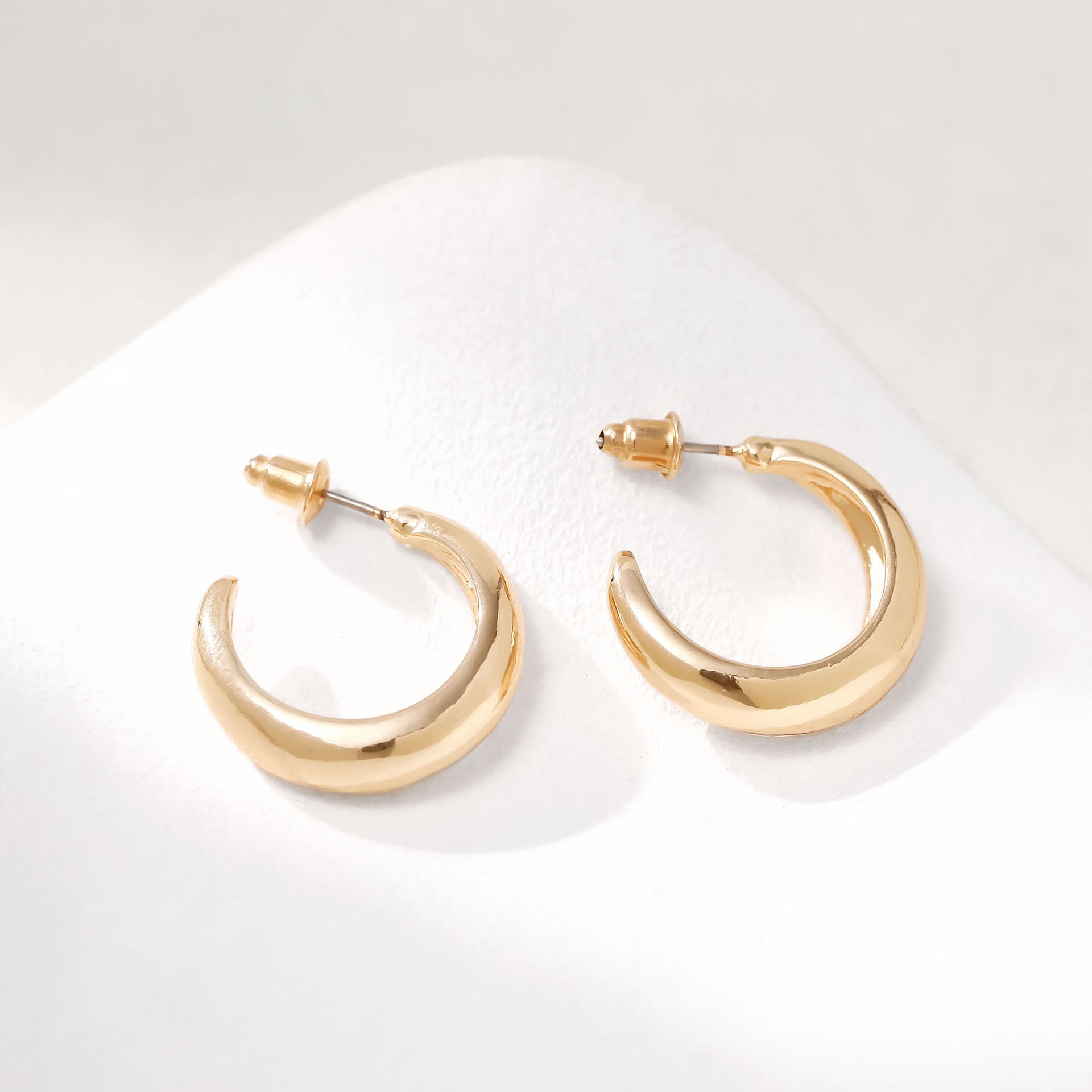 Wholesale gold personality copper earrings