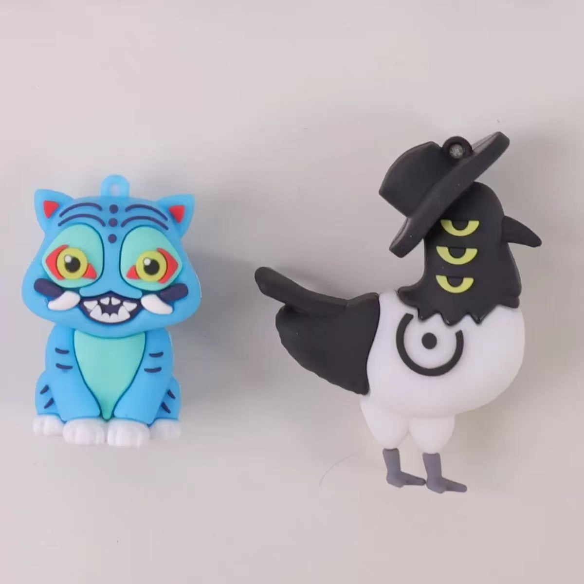 Wholesale PVC soft glue witch hunting girl group surrounding key chain