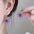 Wholesale zinc alloy purple flower stud earrings