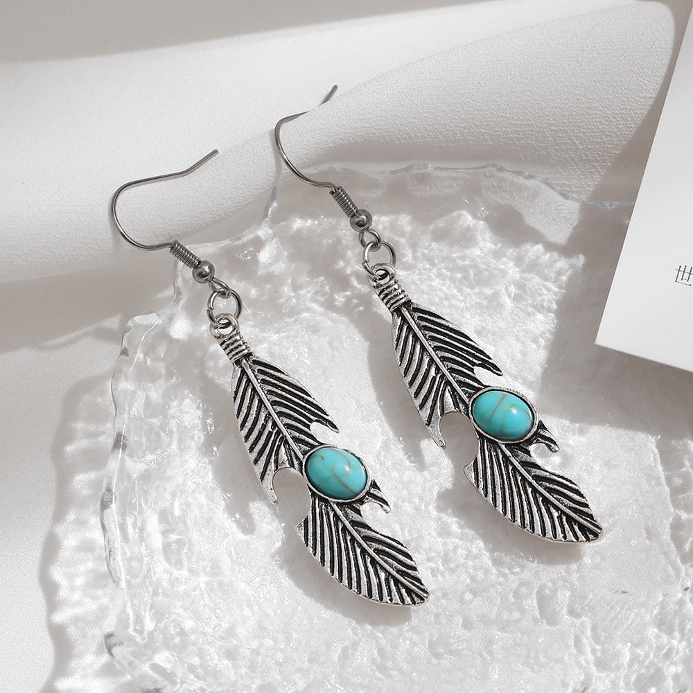 Wholesale  handmade fashion personality feather inlaid turquoise earrings