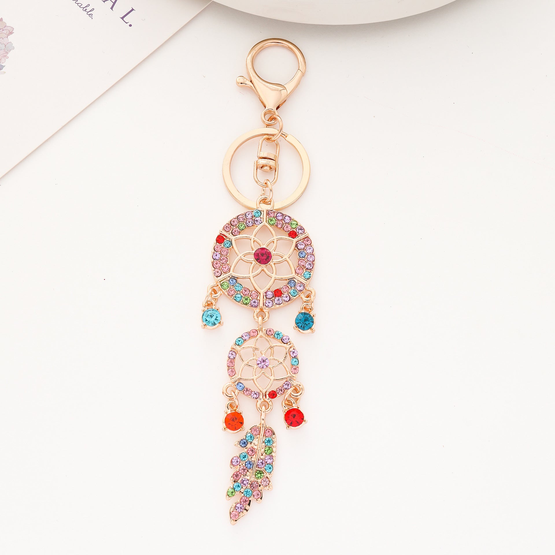 Wholesale  New Dream Catcher Creative Diamond Hollow Feather Keychain Car Bag Pendant Metal Small Gift