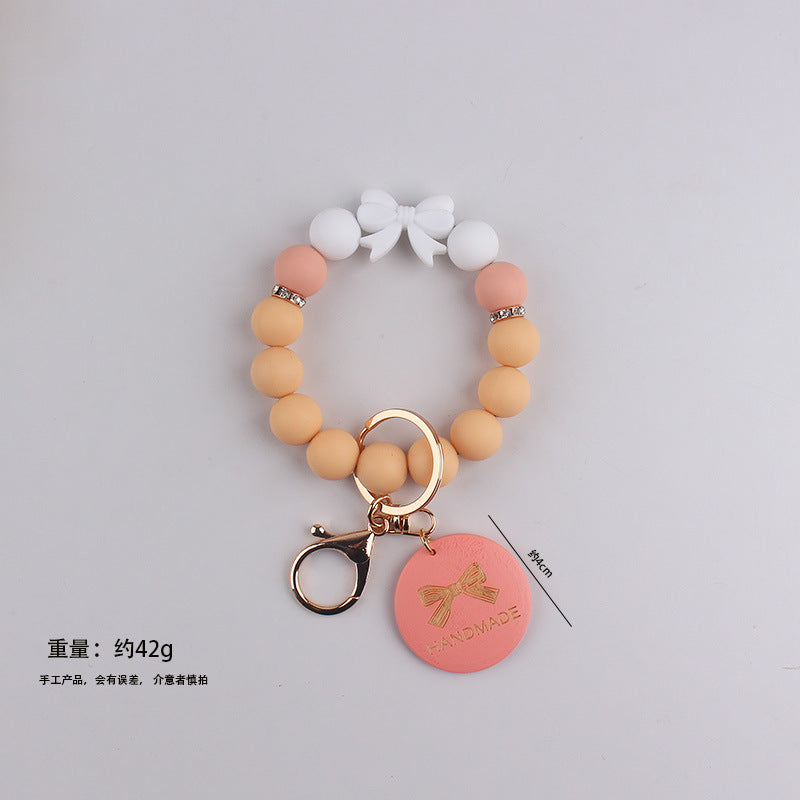 Wholesale Mother' s Day Handmade Gift: Bow-Shaped Silicone Keychain Wristlet