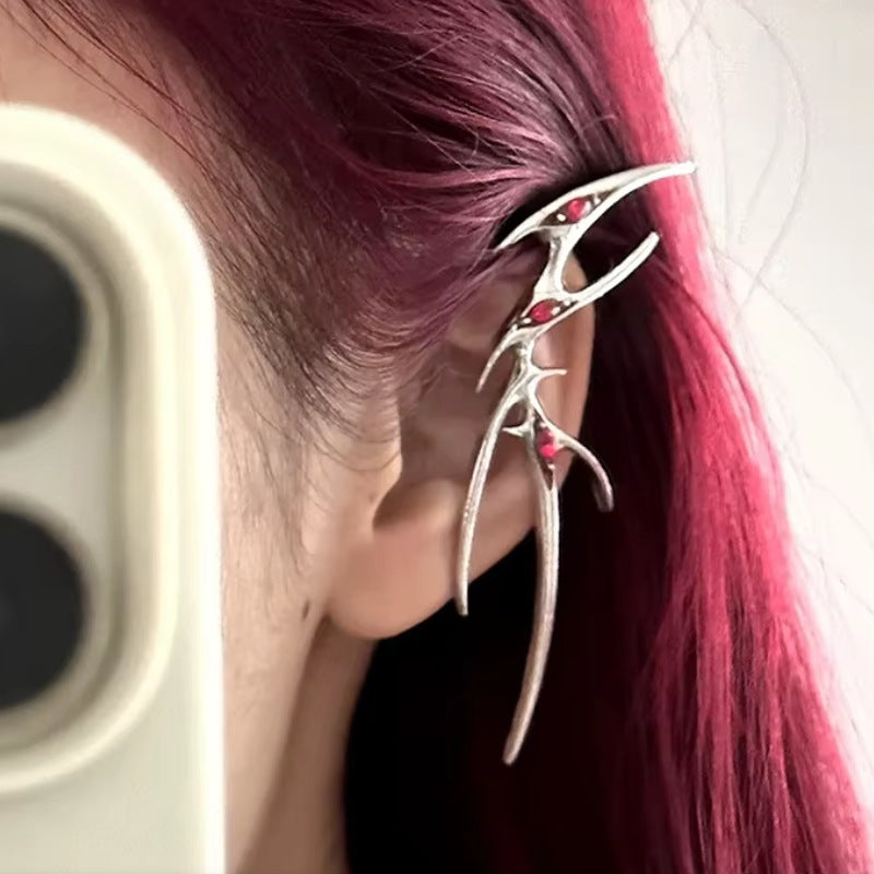 Wholesale Red Thorn Devil's Eye Alien Ear Clip Earrings