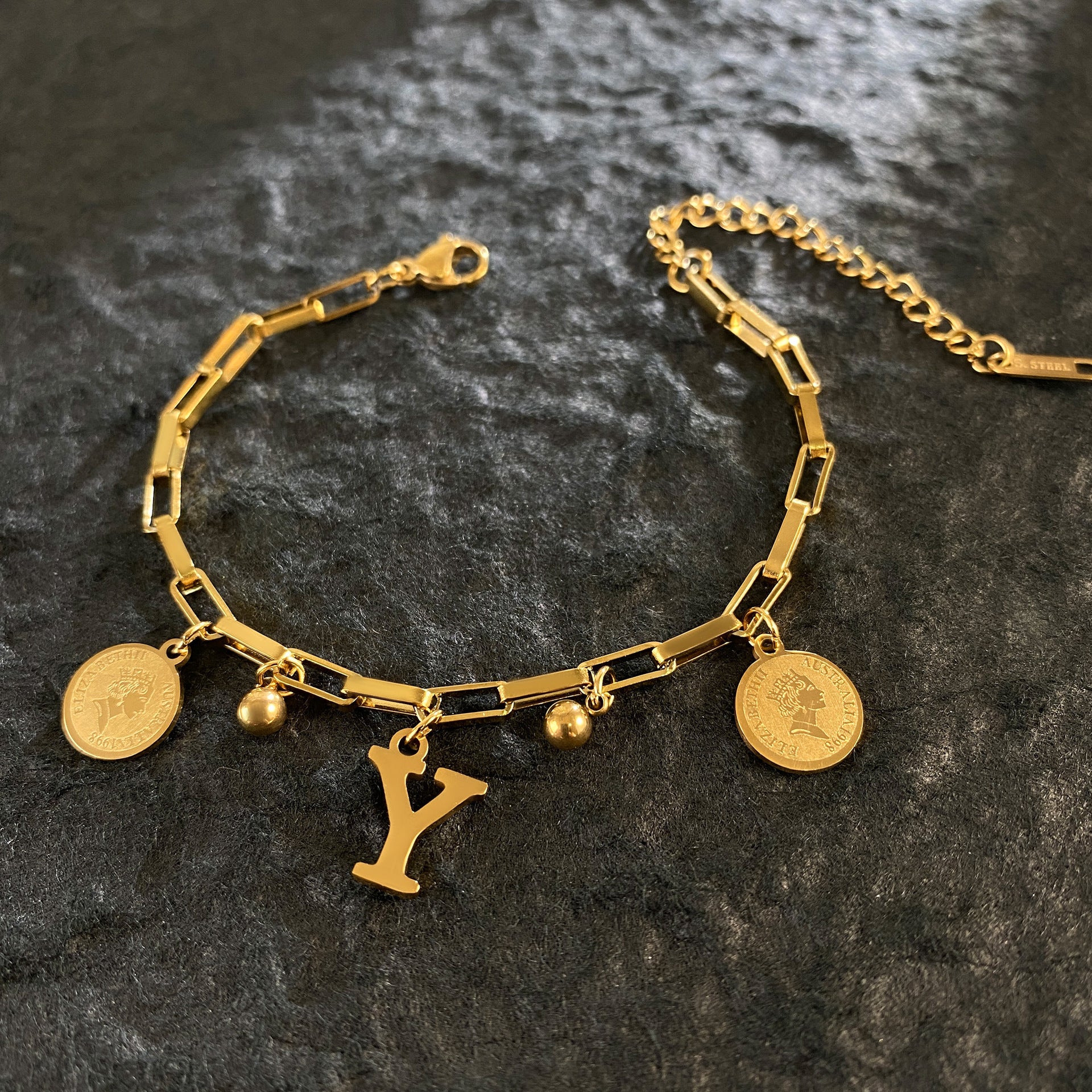 Wholesale Titanium Steel 18K Gold Plated Queen's Head Letter Bracelet ACC-BT-YuXun007