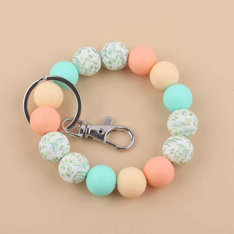 Wholesale Cow Pattern Sunflower Pattern Silicone Beaded Wrist Keychain ACC-KC-GuangTian024