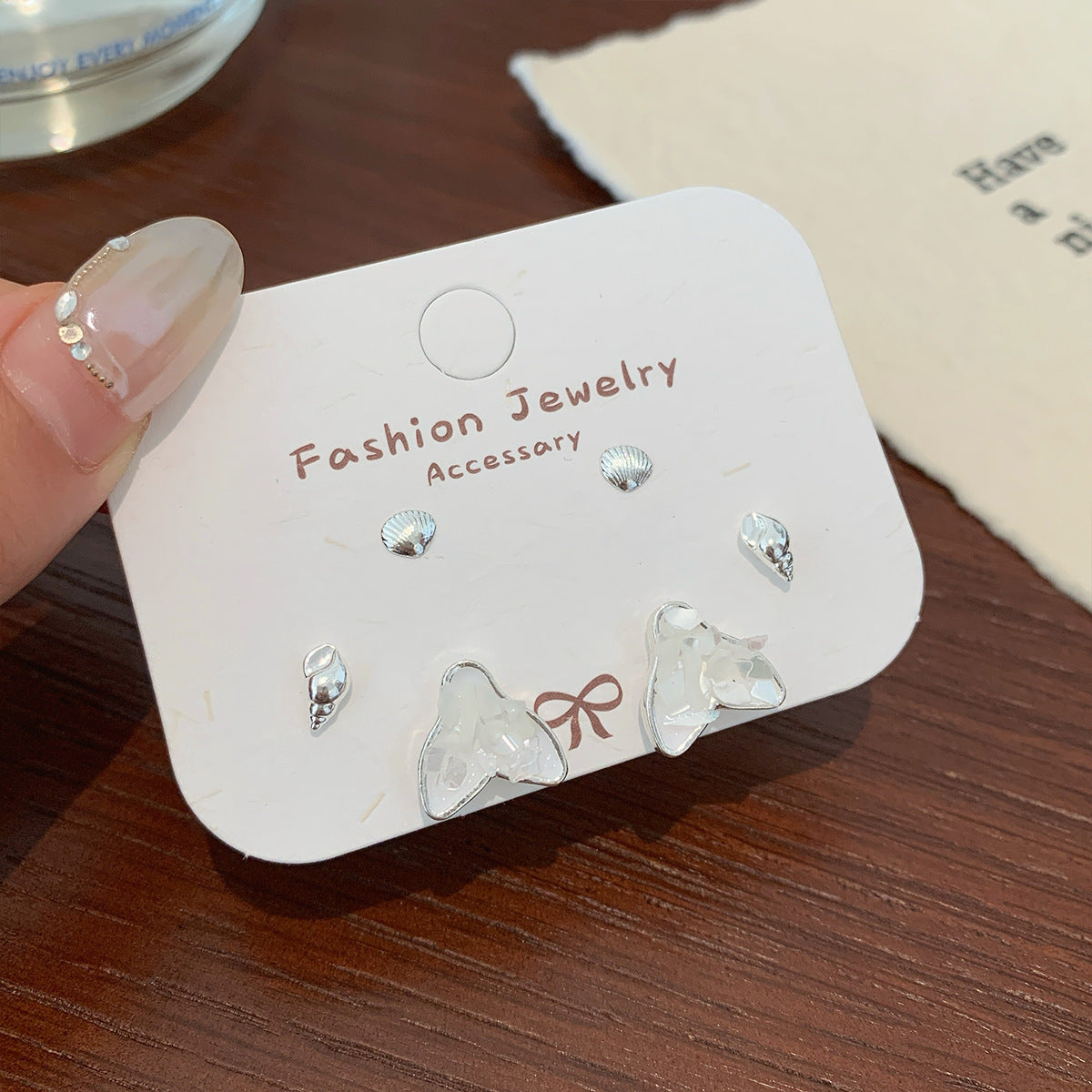 Wholesale Broken shells cat starfish earrings set silver needle heart bow earrings