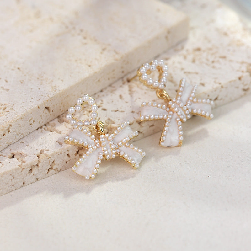 Wholesale Pearl Tassel Bow S925 Silver Needle Alloy Earrings ACC-ES-RuLong006