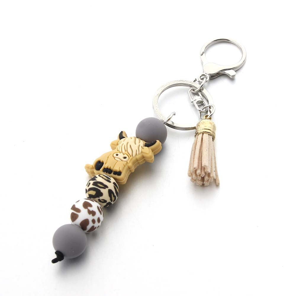 Wholesale Cartoon Cow Teeth Silicone Bead Keychain
