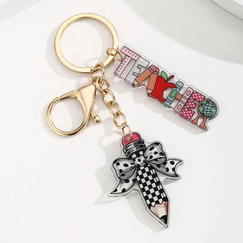 Wholesale acrylic bow pencil letter strip keychain pendant