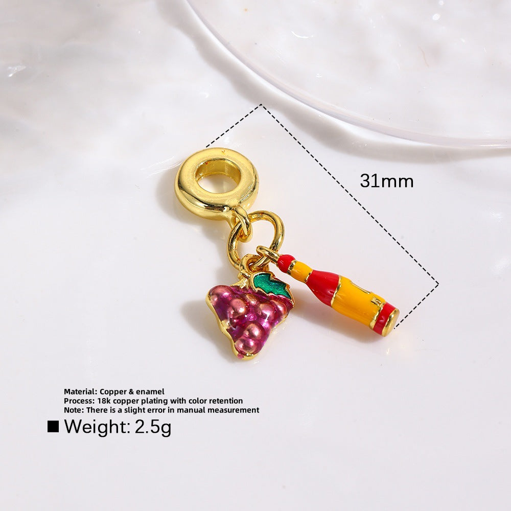 Wholesale Copper oil drop grape cola suitcase camera earphone three-piece pendant set