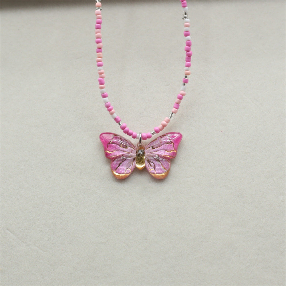 Wholesale gradient color bronzing butterfly sweet pendant rice beads beaded necklace