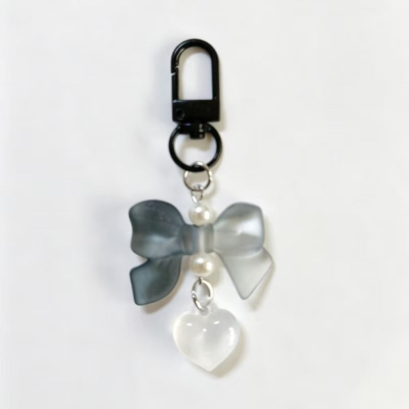 Wholesale Bow Pearl Heart Pendant in Candy Color